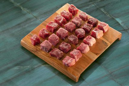 tray full of fresh cut steak served at nuri