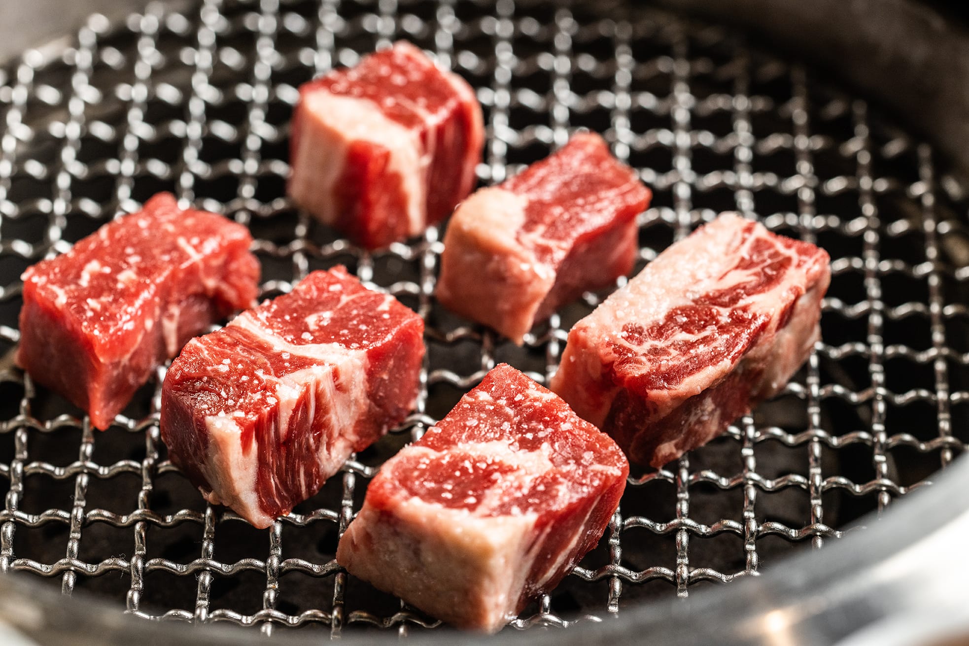close up of fresh steak prepared on korean grill